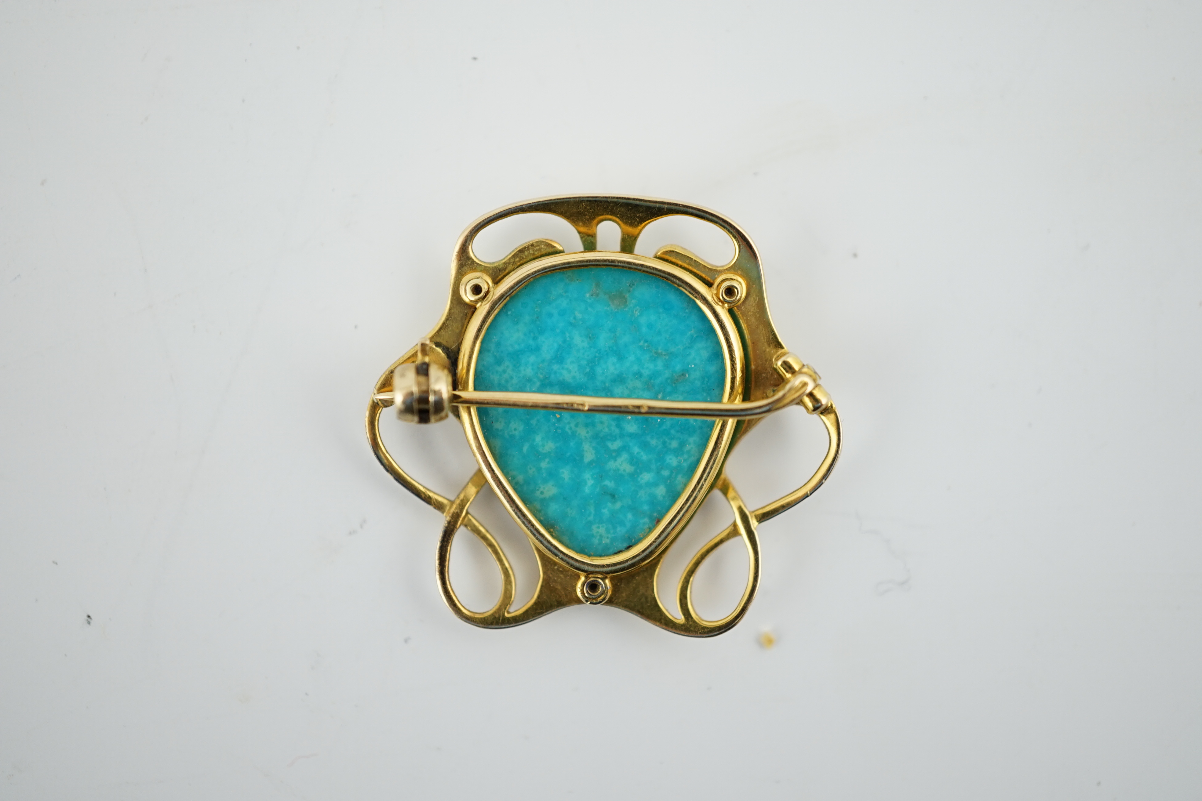 An Edwardian Art Nouveau gold and turquoise set brooch, by Murrle Bennett & Co